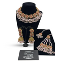 Intricately designed set with pearls and pink finish