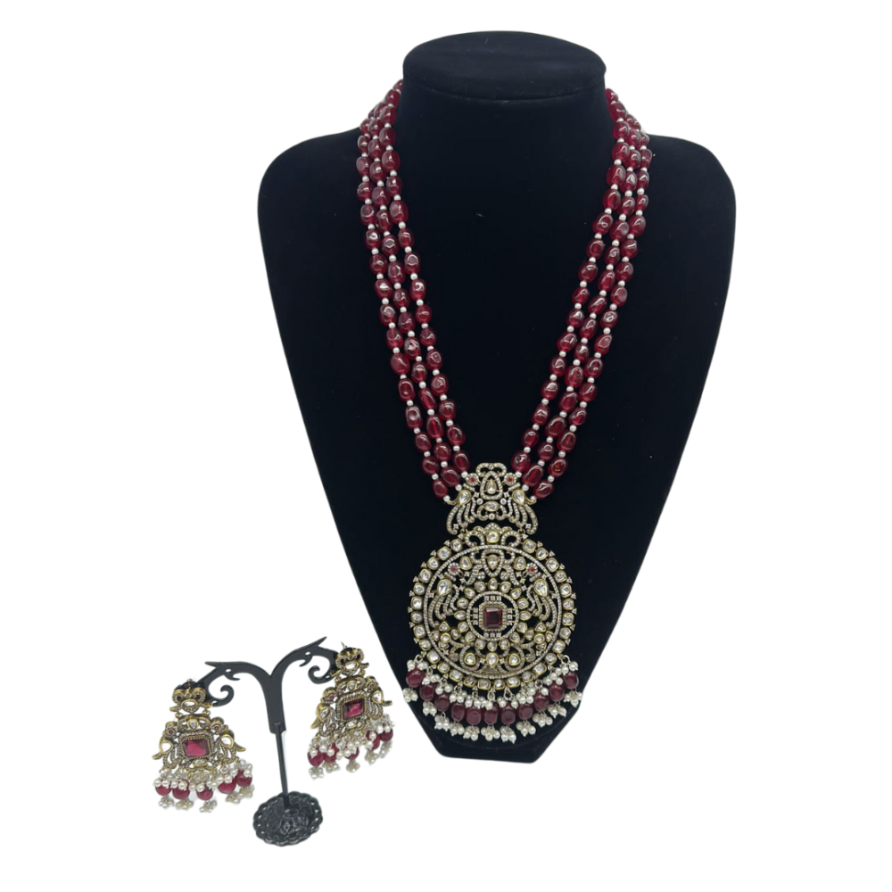 Victorian pendant set with ruby strands and pearls finish