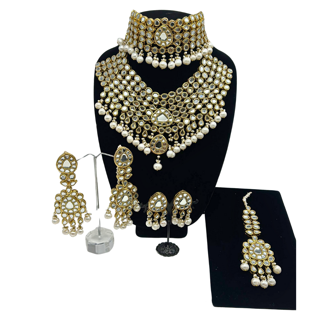 High end kundan double necklace with real pearls hanging comes with 2 pairs of earrings and matching tikka