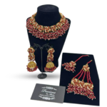 Intricately designed set with pearls and ruby finish