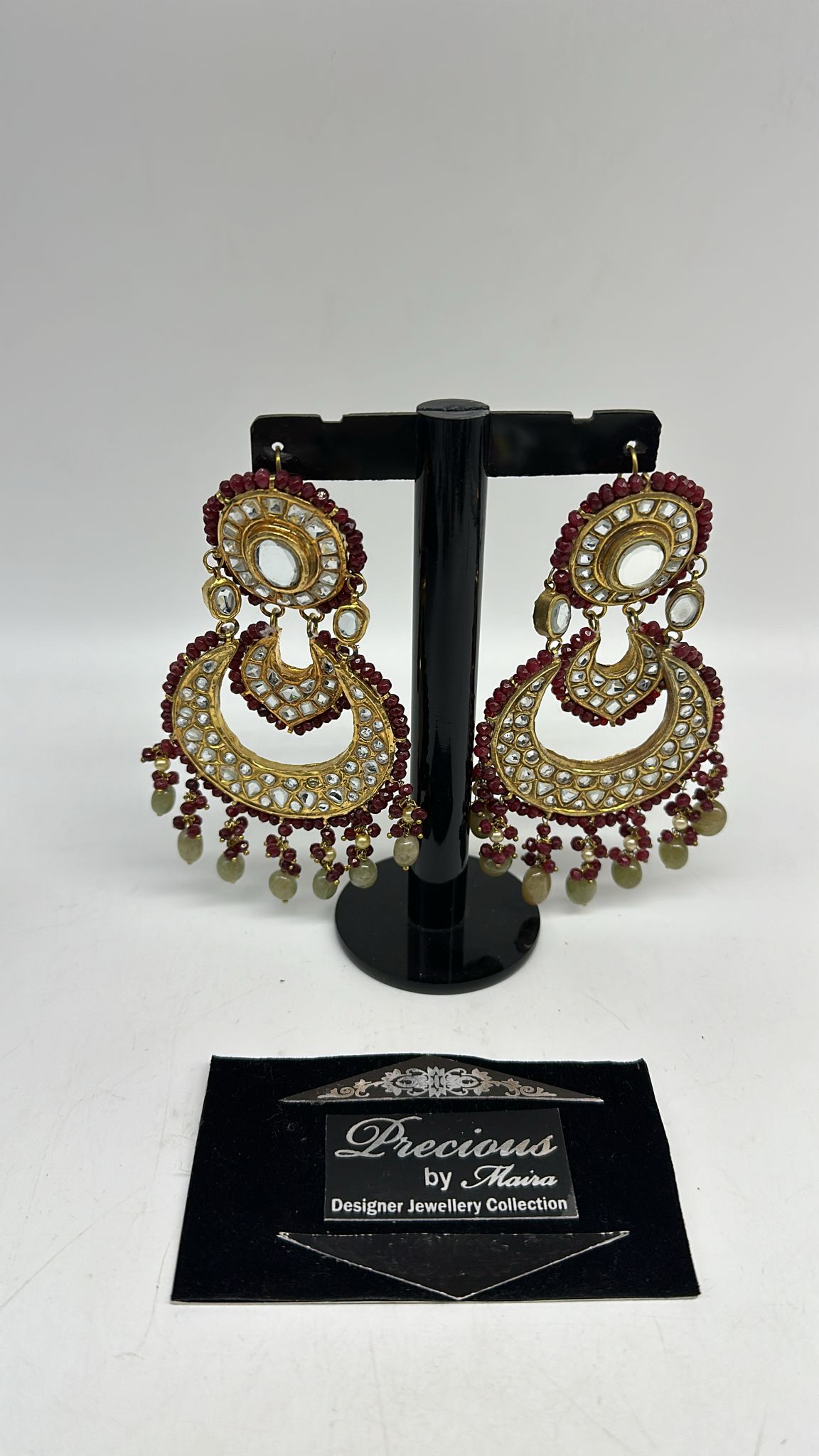 Chandbali style earrings with semi precious ruby border and mint green droplets